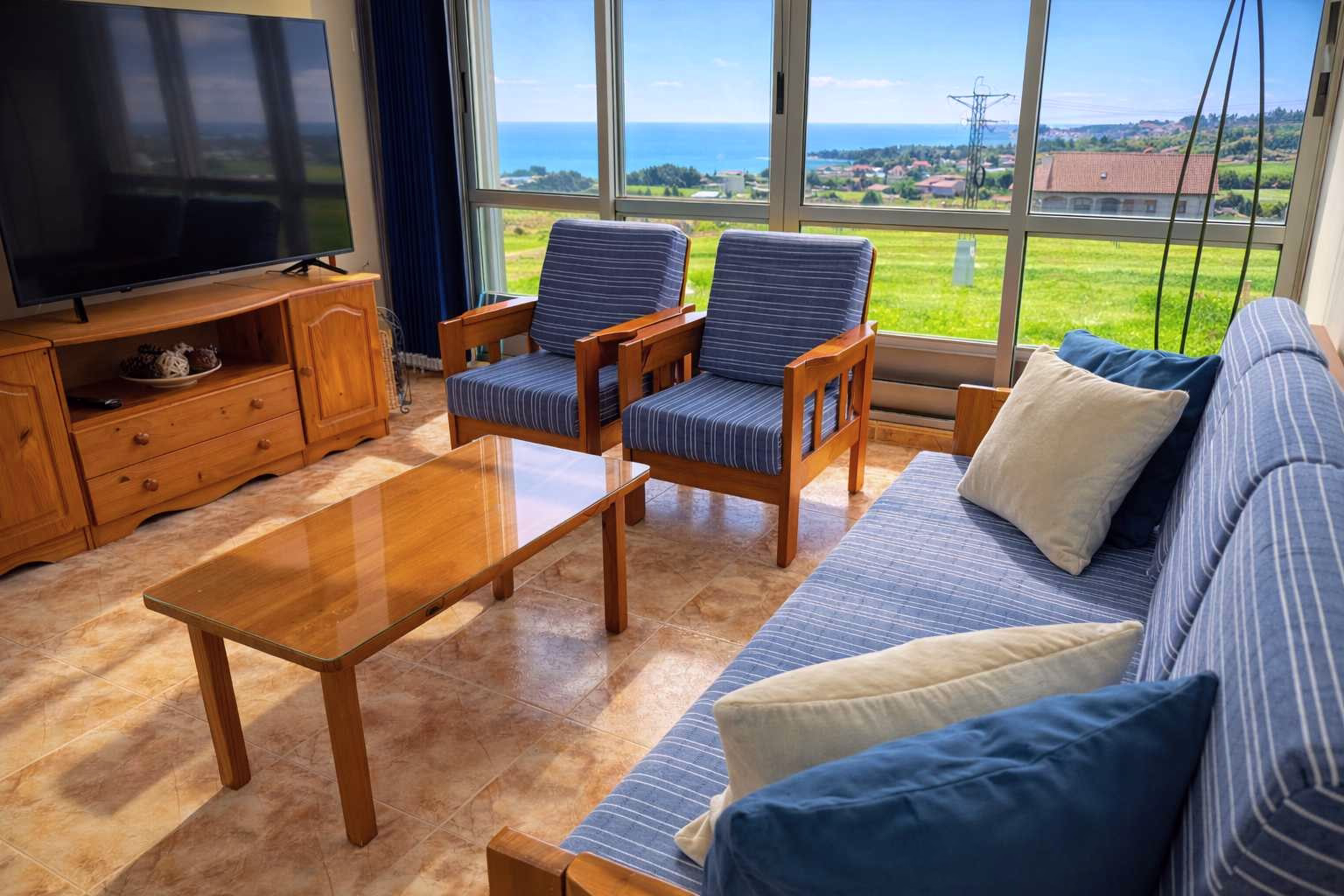Interior del apartamento Panorámico Premium en Sanxenxo, con vistas panorámicas al mar y a la Isla de Ons